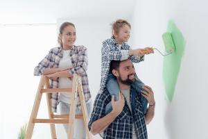 happy family renovating home on a small budget